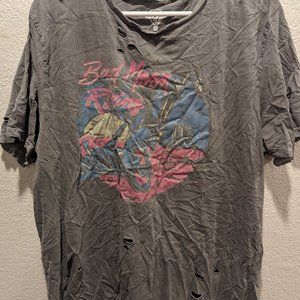 Oversized and distressed graphic tee